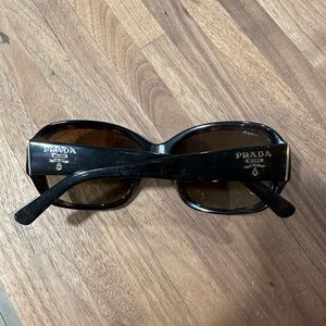 Prada women’s sunglasses.